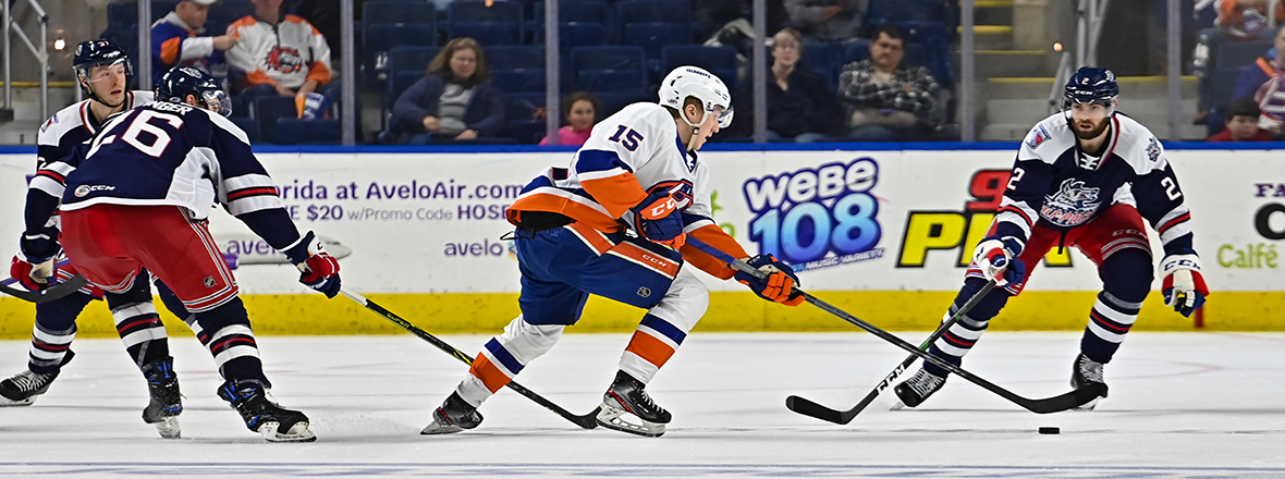 WOLF PACK SCORE TWICE LATE, BUT ISLANDERS WITHSTAND RALLY TO KNOCK OFF HARTFORD 5-3